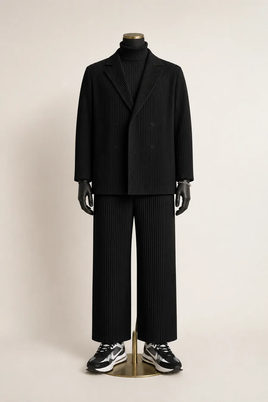 Pleats over the double Swoosh on a mannequin
