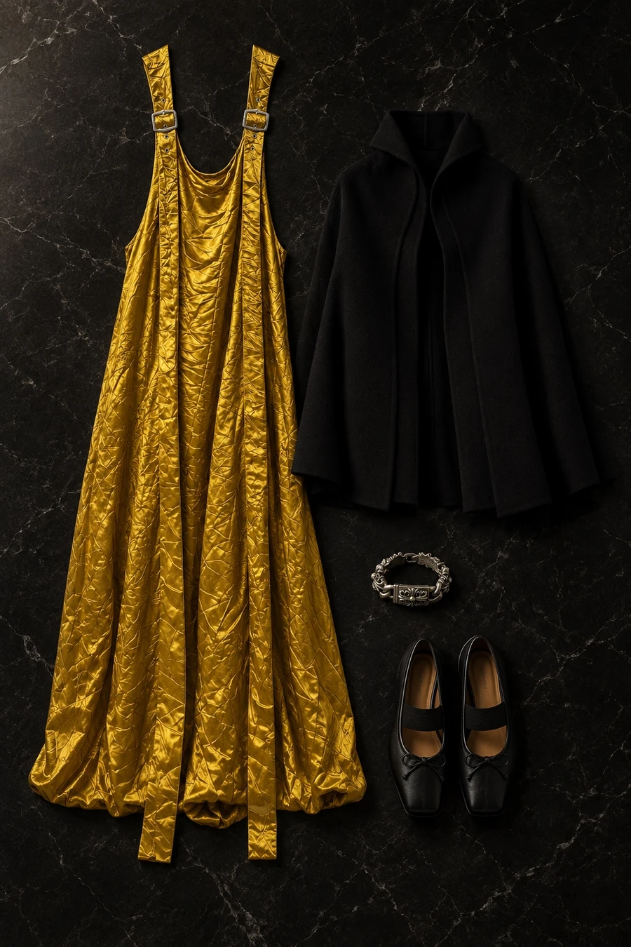 A black tie gala in gold. Flat lay of a gold Sies Marjan gown, an obsidian RUOHAN jacket and black MM6 ballet flats.