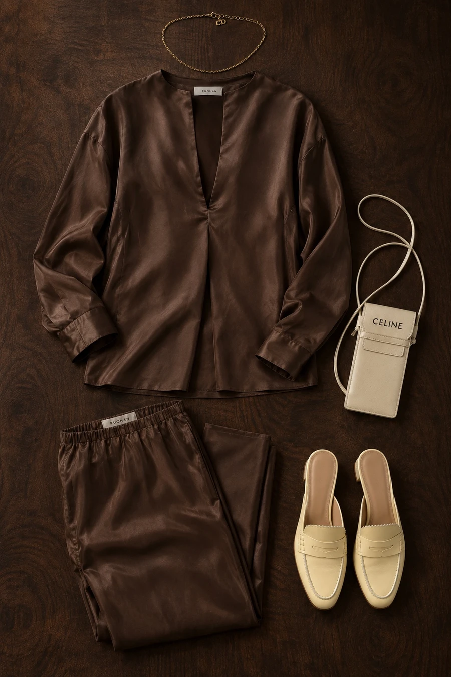 A dinner party at home. Flat lay of a chocolate brown RUOHAN shirt, chocolate brown trousers and yellow MM6 mules.