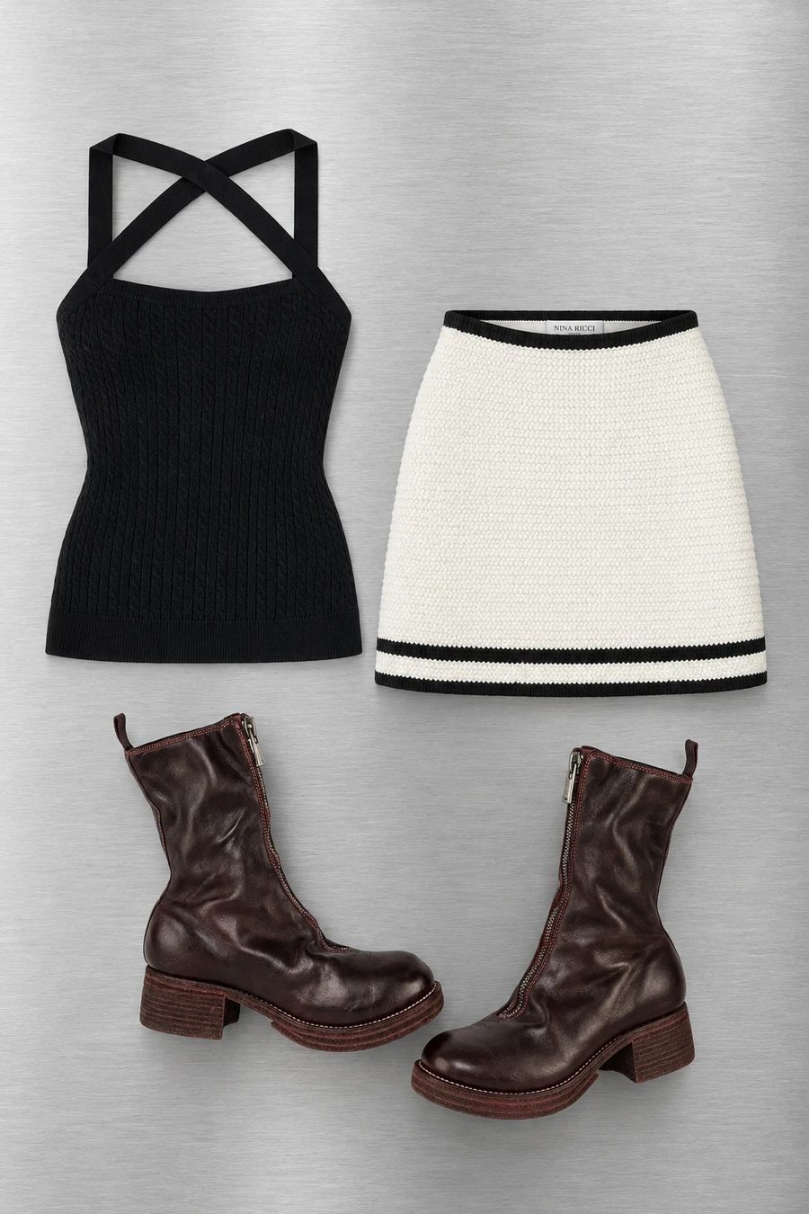 A black Patou top, white Nina Ricci tweed skirt and burgundy Guidi boots.