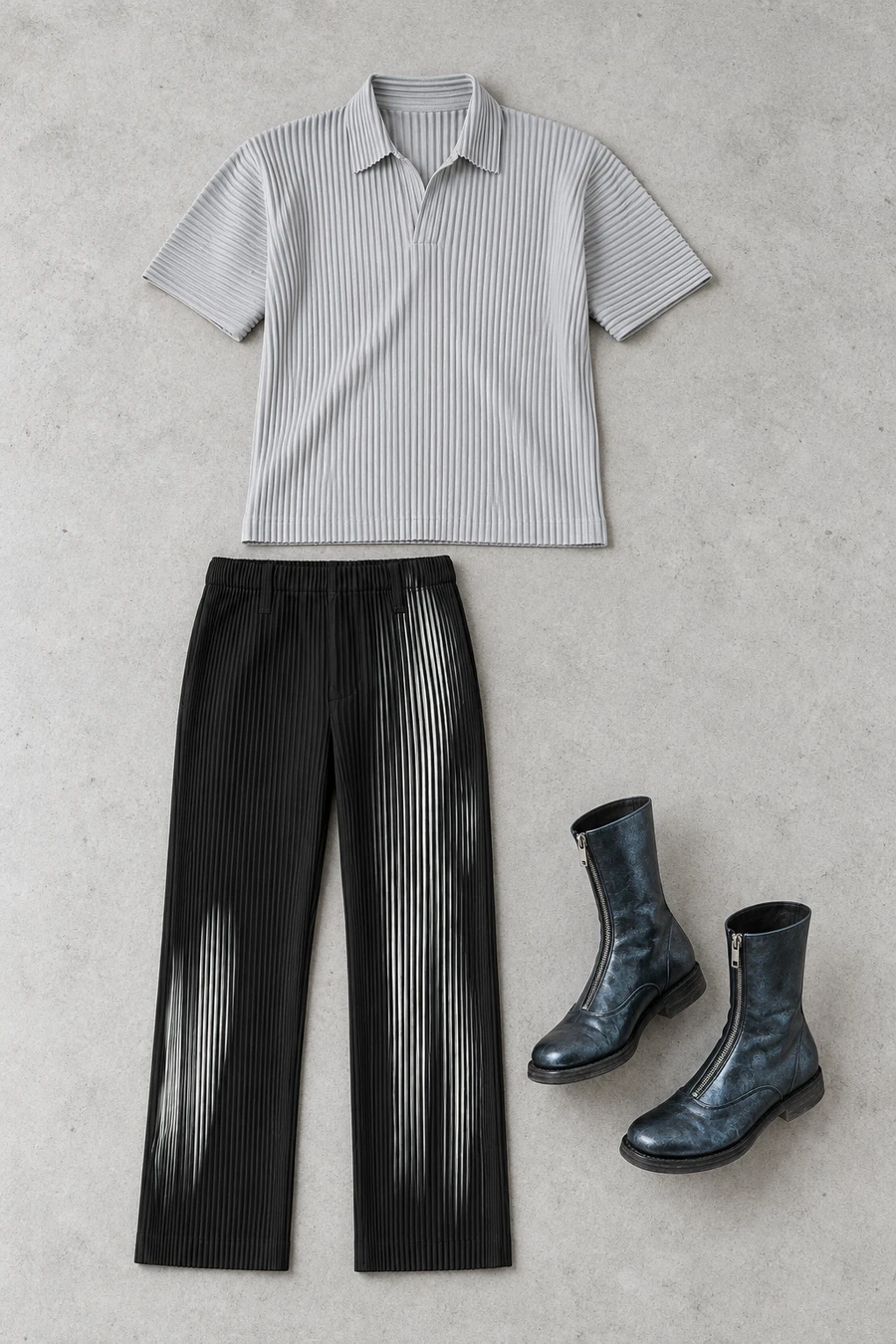 An overhead flatlay of Homme Plisse Issey Miyake Basic Pleated Polo Shirt L.Grey, Homme Plisse Issey Miyake In the Shadow Pleated Trousers Shadow Black, Guidi 310 Front Zip Boots Metallic Blue.